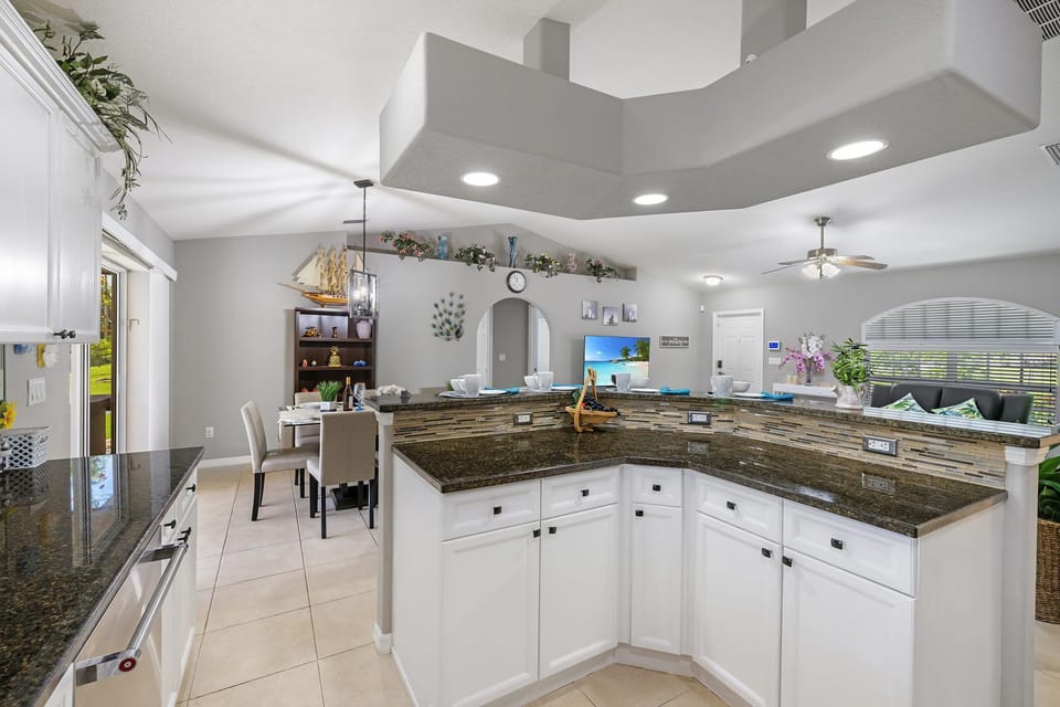 The kitchen overlooks the rest of the home