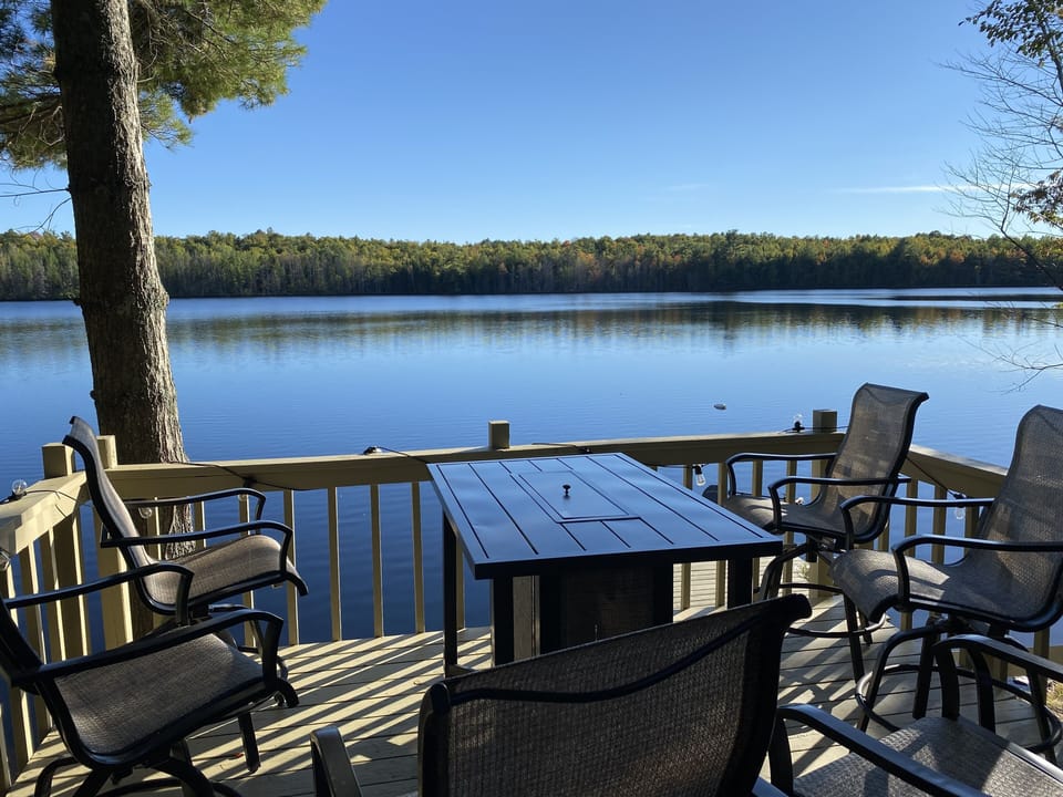 Lakeside Deck with 6 swivel chairs and gas fire table (May through October)