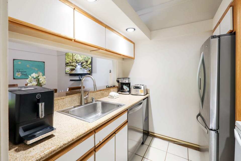 Fully stocked kitchen includes a variety of small appliances