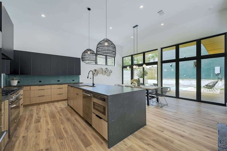 The kitchen overlooks the beautiful pool