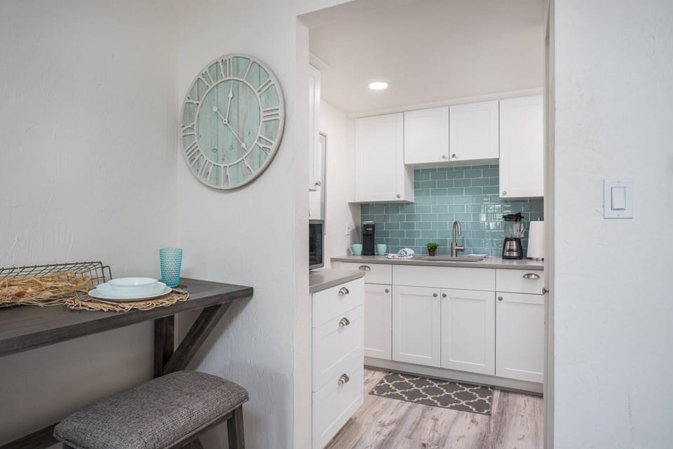 Kitchenette off the main room.  Microwave, (no oven/stove), blender, coffeemaker, toaster etc. are included.