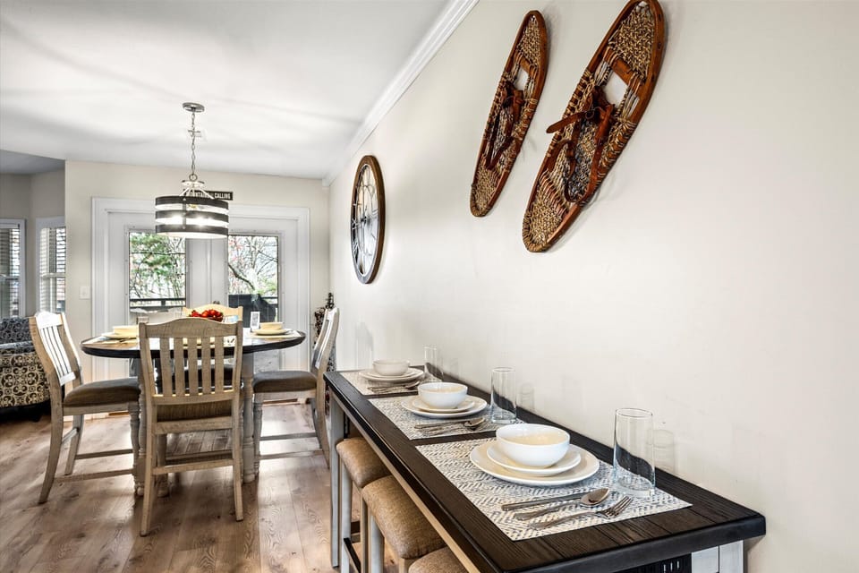 Breakfast bar and dining room table with a fully stocked coffee bar!