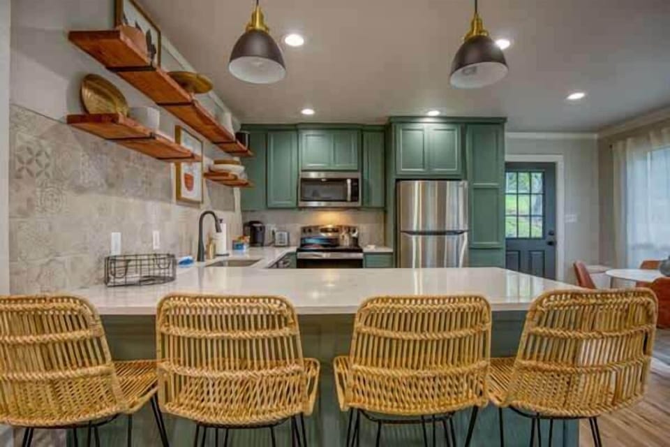 Kitchen with bar stools — great for casual meals and chats.