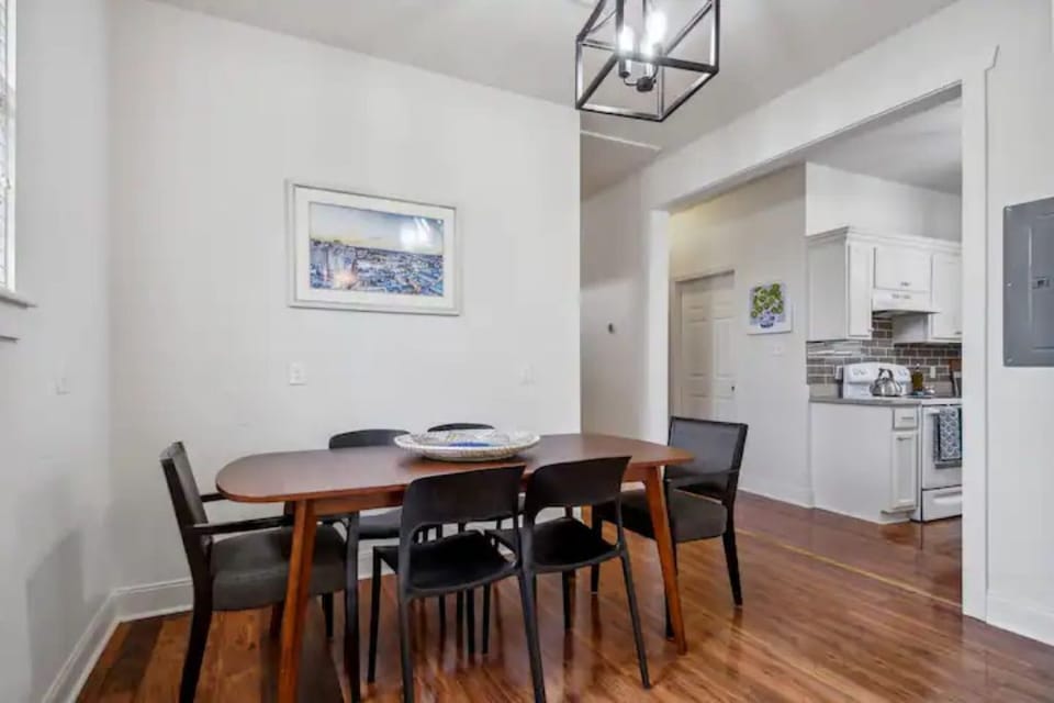 Our dining room flows between the kitchen and the living room.