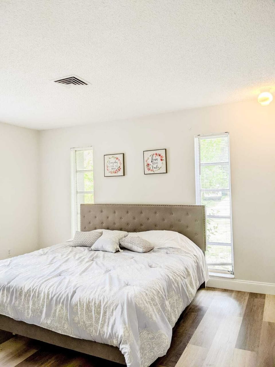 Bedroom #1: King size bed with a chair