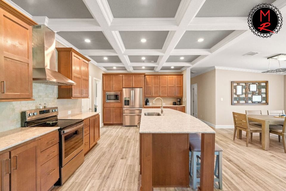 Our Factory Ride 4 bedroom 3 bath home sleeps 12
dining, kitchen area, large stove, fridge freezer, plenty of room to make amazing meals for the entire team
