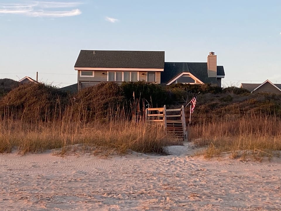 Ocean view showing house as FRONT lot with 90' width
