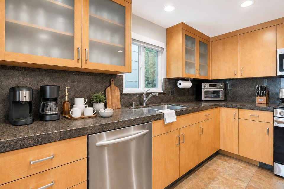 Fully equipped kitchen with modern appliances, perfect for preparing gourmet meals or casual snacks.