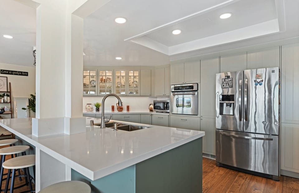 Large refrigerator and spacious island with space for 4 dinning spaces.  