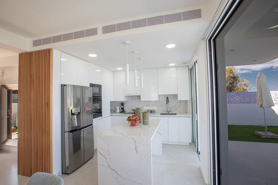 Modern kitchen fully equipped with all appliances and utensils