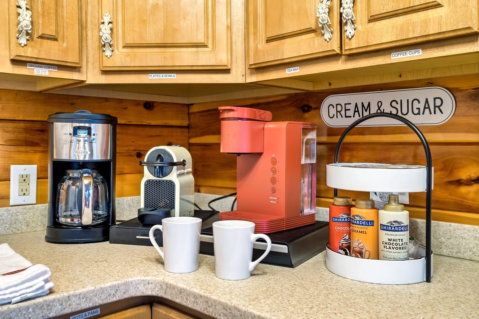 Morning made easy with Keurig, kettle, and a full coffee and tea bar setup.