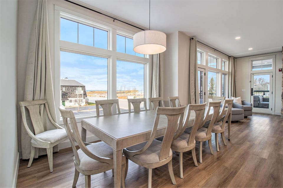 2nd floor dining room table and 12 chairs.