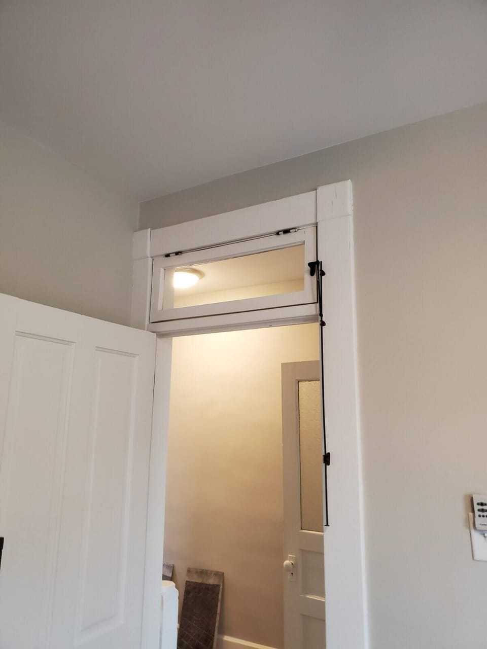 upstairs has original 12 foot ceilings and transom windows with original hardware!