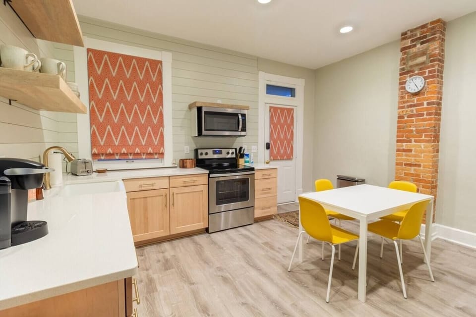 Brand new kitchen, fully stocked with cookware, serving ware, dishes and full size appliances 