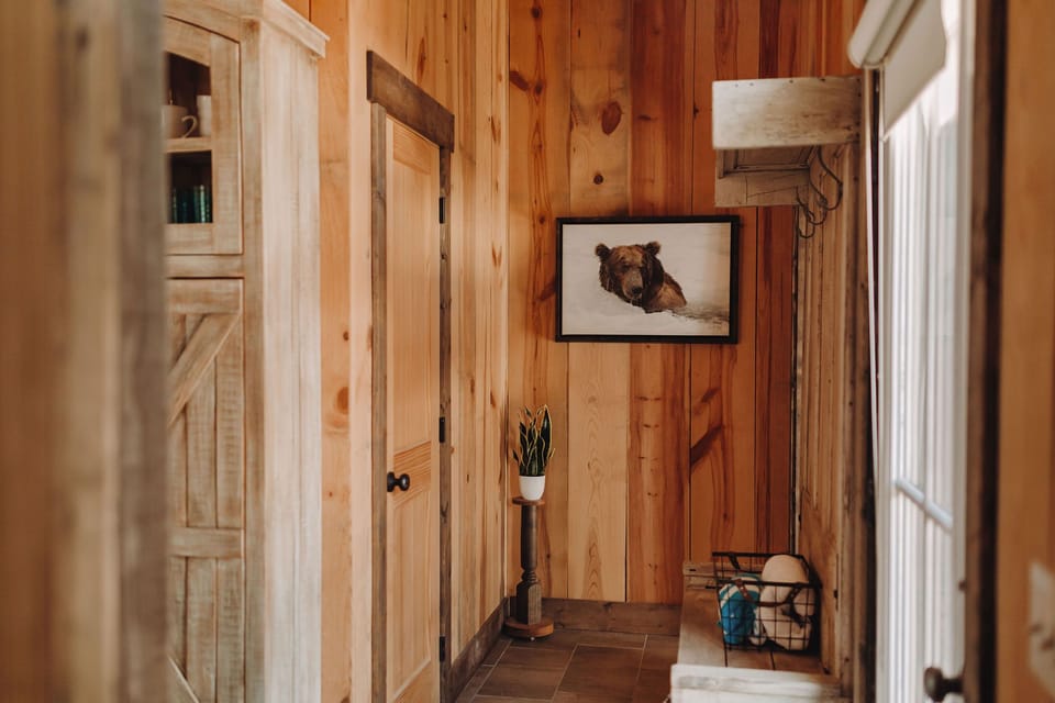 Wash sand off with the outside shower then hang towels/shoes in the mud room.