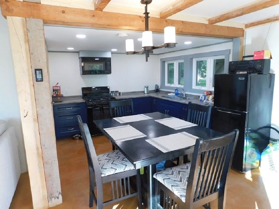 Dining room and Kitchen. You are standing back to one of the large french doors