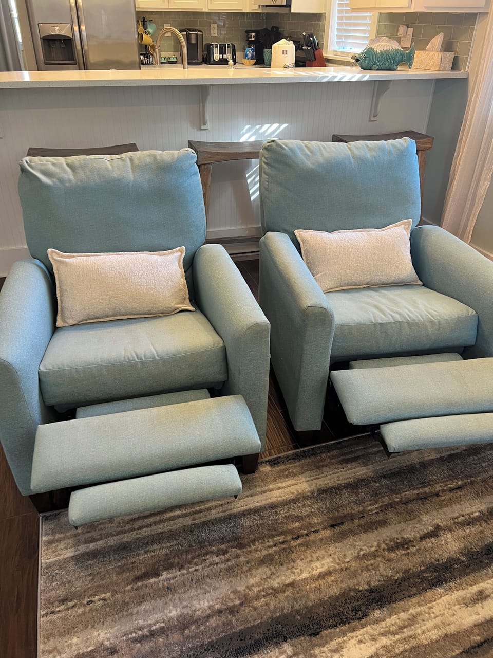 Two comfy recliners in living room 