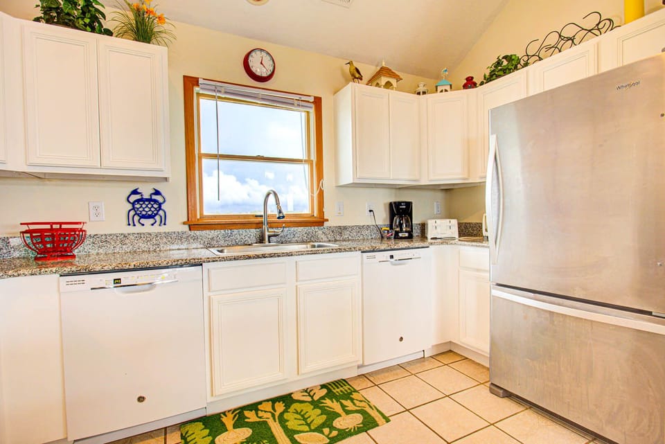 . A large Kitchen with modern appliances, two dishwashers, and plenty of prep space will make it easy for you to cook for the whole family.