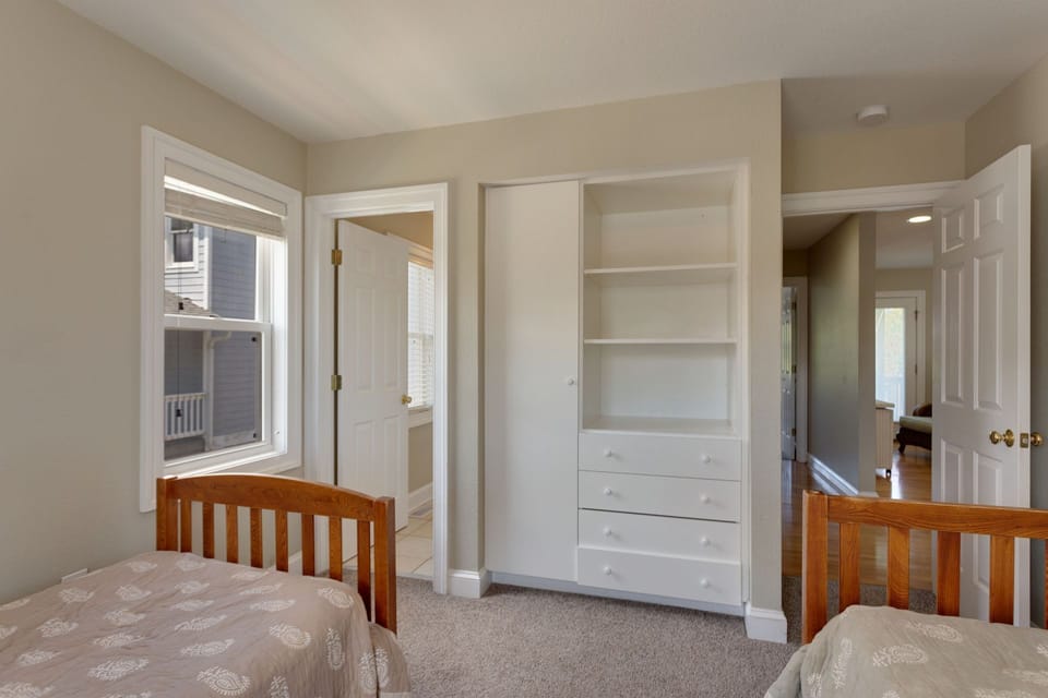 Catch some z's in one of the Mid-Level Master Twin Bedrooms with an attached bathroom!