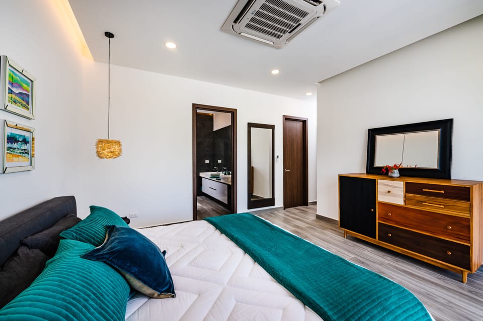 Master bedroom with king size bed opens to balcony with ocean views