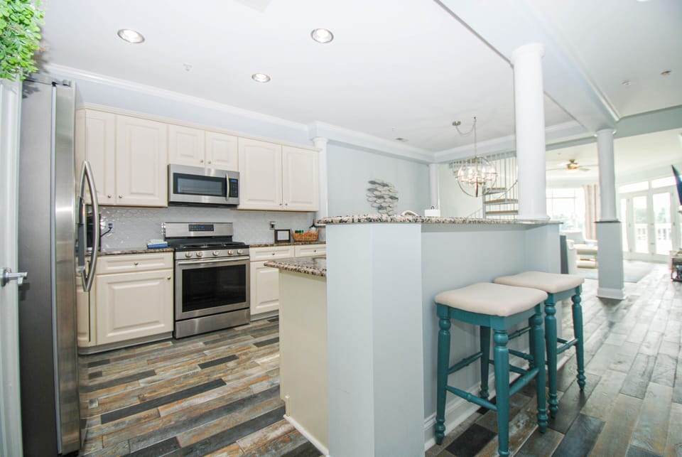 Updated, stocked kitchen to prep all your group meals with island seating for 4.
