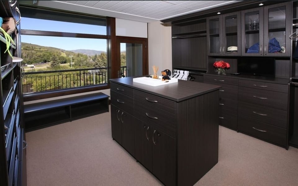 Primary bedroom with balcony, ensuite bathroom, walk-in closet, private balcony