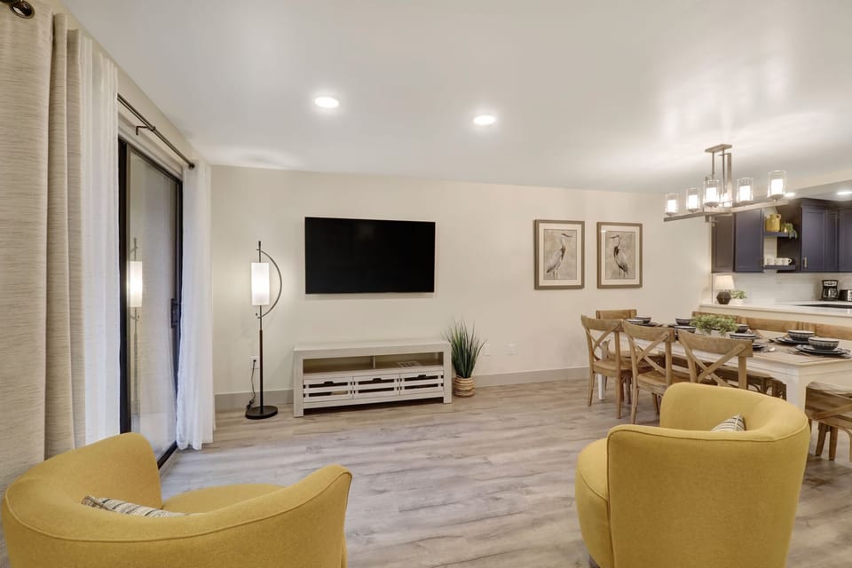 Xanadu A8 - Living and Dining Area - Plenty of space to watch the new 60" TV in this beautiful living area.