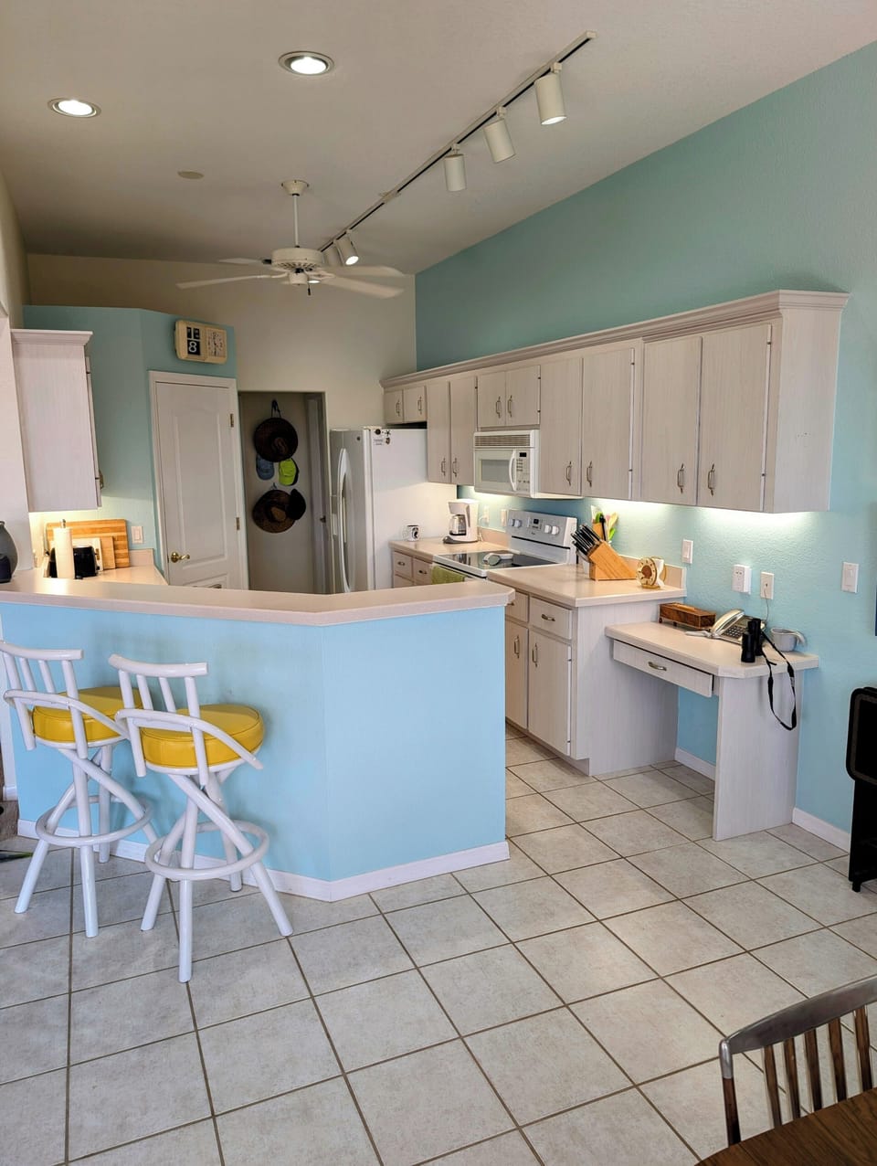 Bright and spacious kitchen.   Well stocked.  Plenty of counter space. 