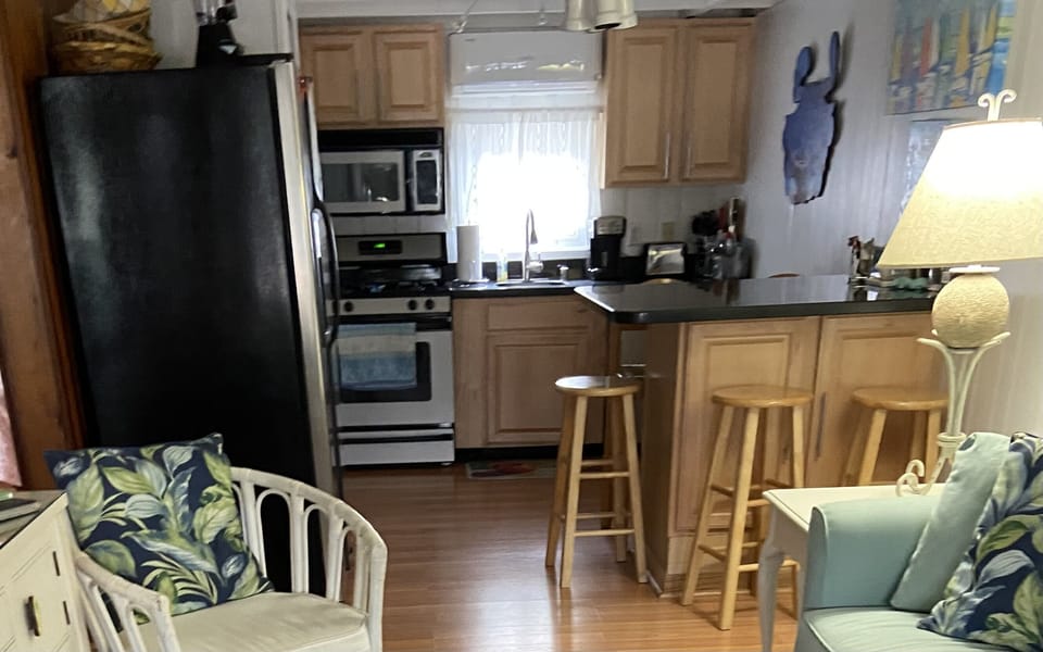 Well appointed fully functional kitchen with gas stove and full sized appliances