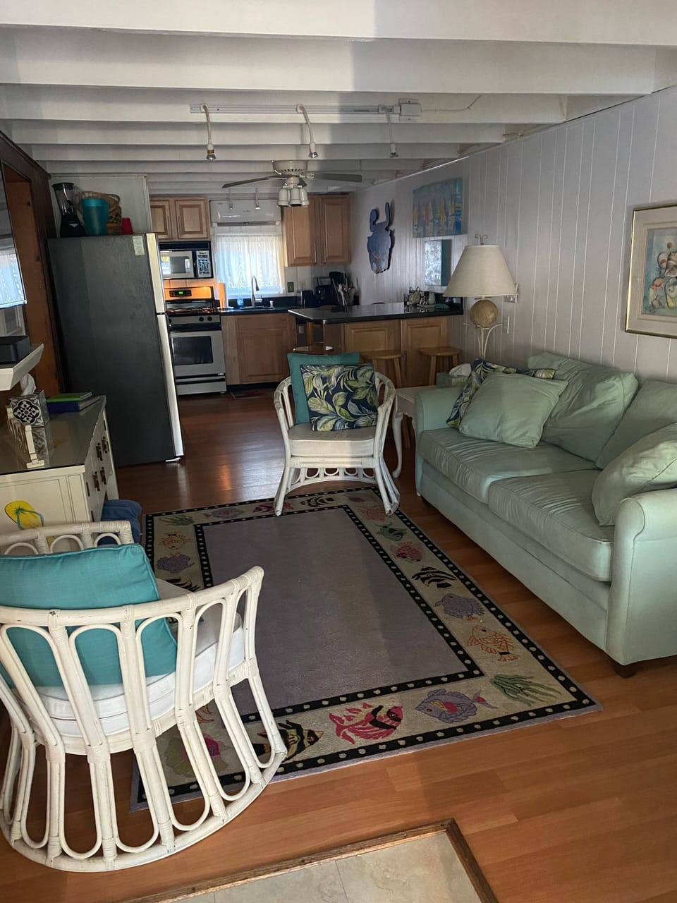 Open floor plan with kitchen at the back