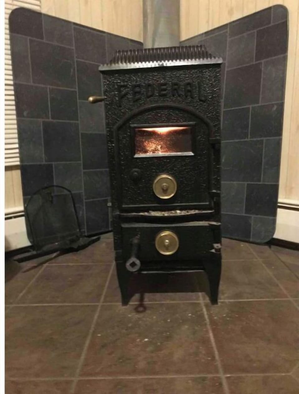 old caboose refurbished wood stove that works well and feels great in the winte 
