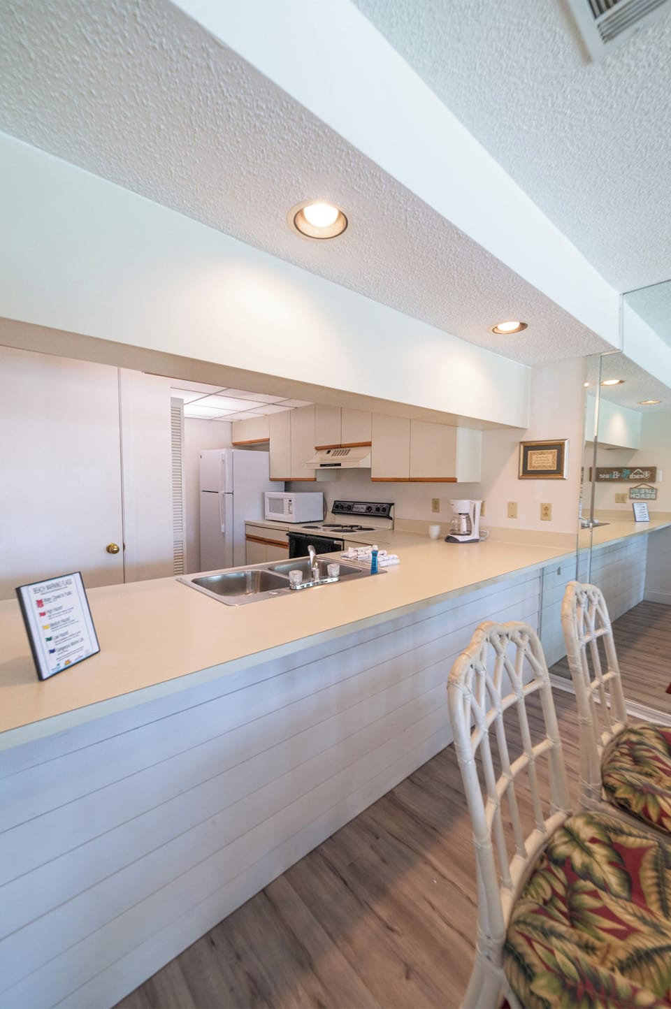 Kitchen bar lets everyone help with the cooking.