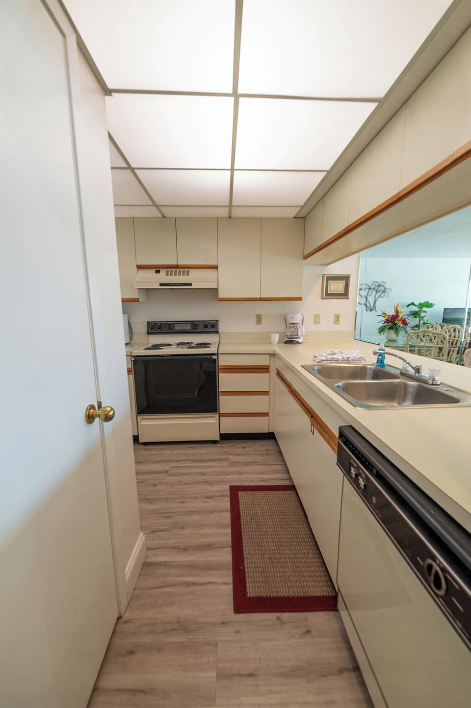 Galley style kitchen has all the appliances you need to prepare a quick snack or a gourmet dinner