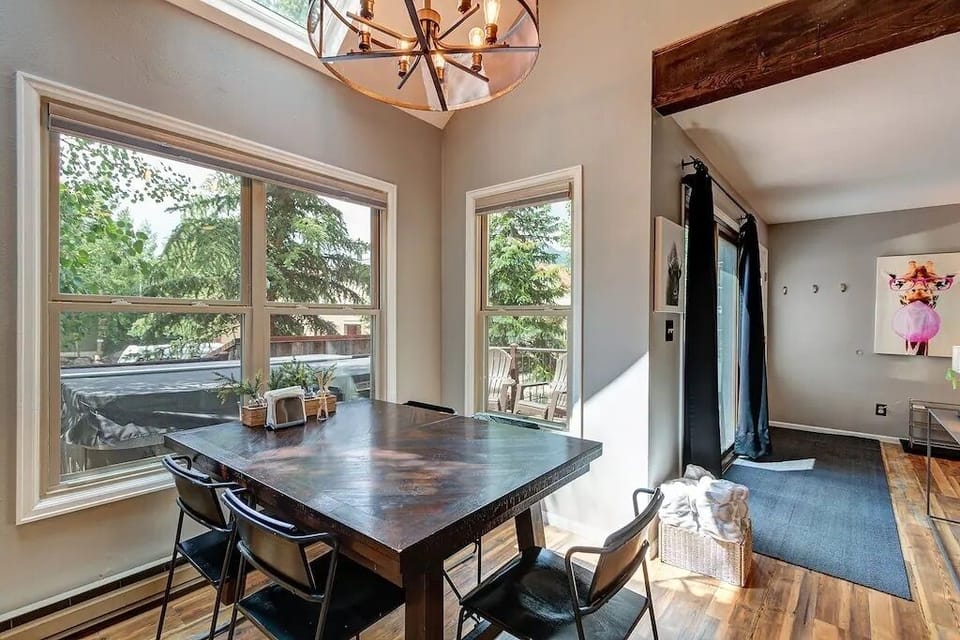 Dining for Six — A welcoming table for six (with leaf + extra chairs) beneath vaulted skylights—ideal for hosting your crew. 🍽️🏡