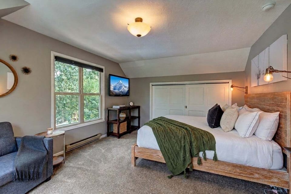 Primary King Suite - Spacious top-floor retreat with premium hotel-quality bedding and panoramic Breckenridge views.