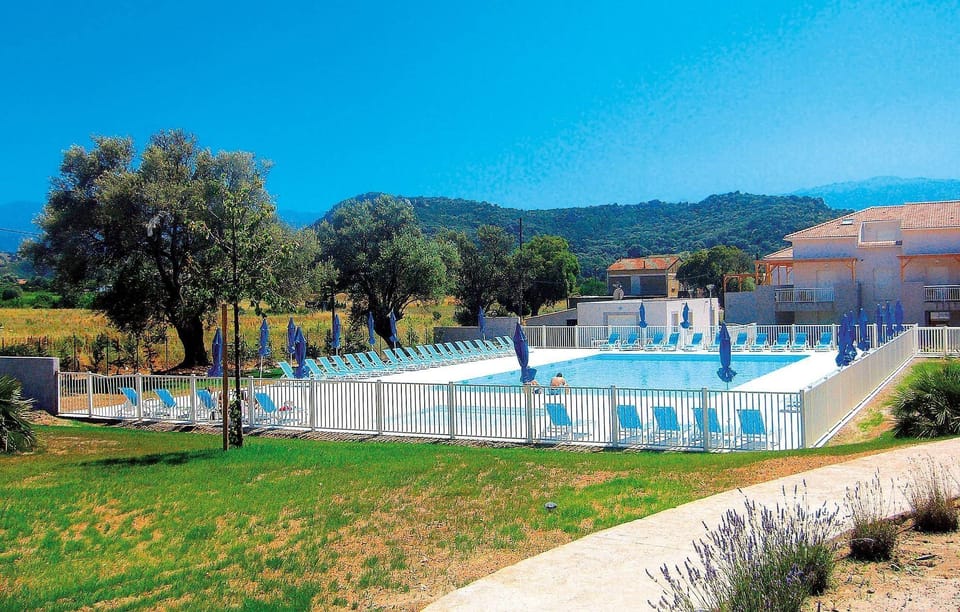 Take a refreshing dip in the outdoor pool.
