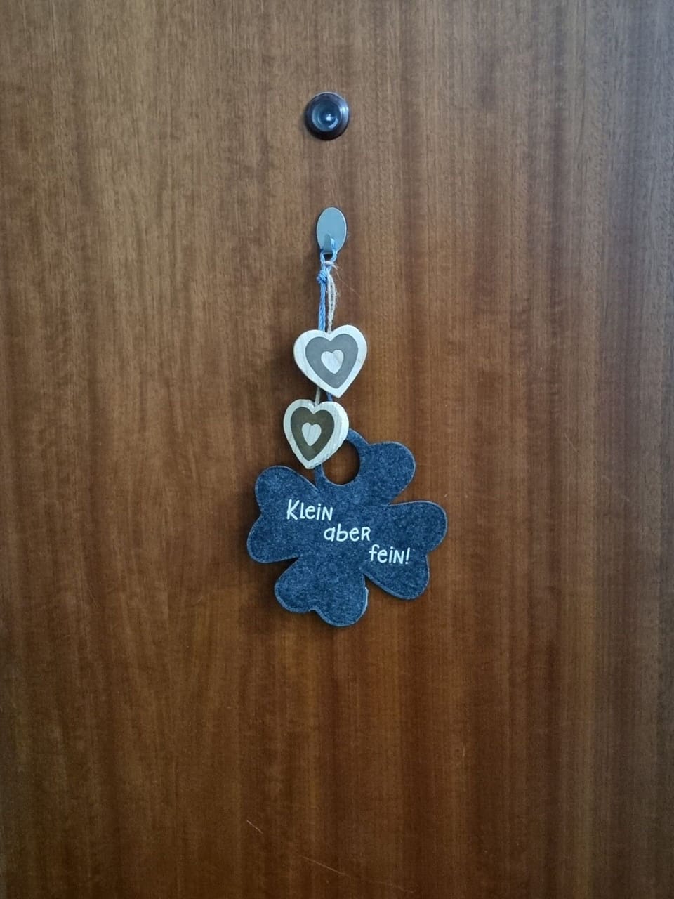 Wood, Natural Material, Jewellery, Electric Blue, Font, Petal