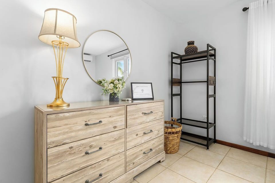 Unpack and feel at home! Our spacious dresser and open shelving unit mean you'll have plenty of room to store your belongings and keep your space organized. Vacation without the clutter.