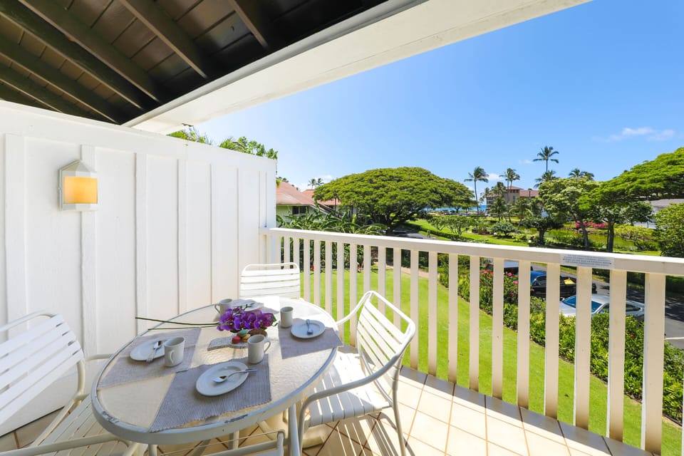 Enjoy dining al fresco and peekaboo ocean views on your private lanai.