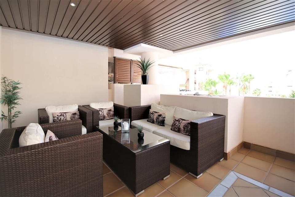 Seating area for six guests on the lovely private balcony