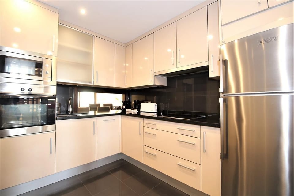 Modern kitchen is fully equipped with quality appliances
