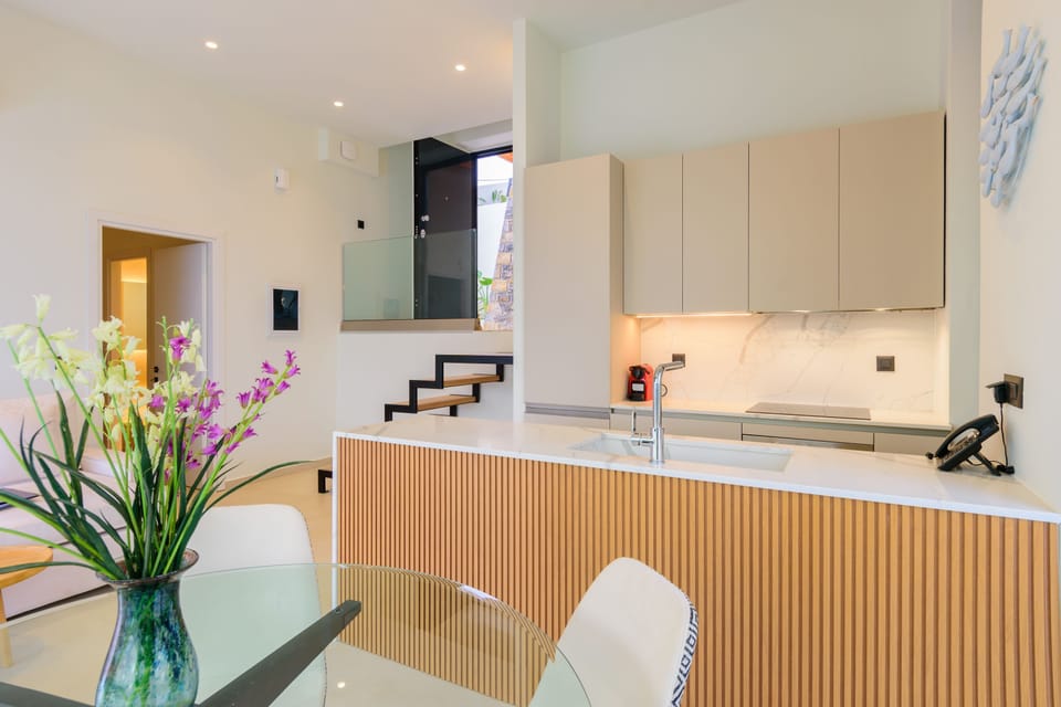 An island counter in the kitchen provides additional workspace.