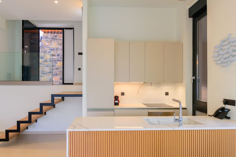 The kitchen is fully equipped with modern appliances and amenities to cater to your culinary needs during your stay.