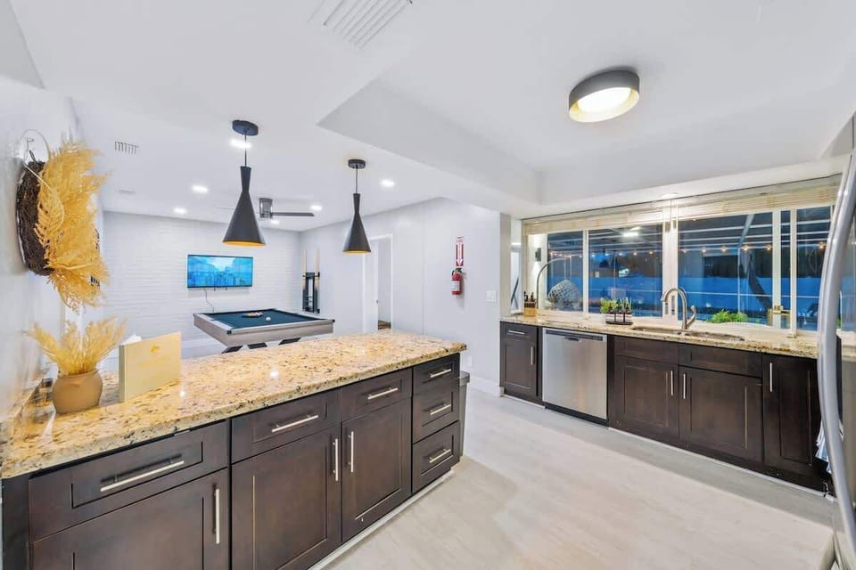 Fully stocked kitchen with pass through windows.  We have everything you will need to cook: henckels’ knife set, pans / pots, utensils, bowls plates, spices, oil, rice cooker, kettle, toaster, full size coffee maker, dishwasher, glasses and more…