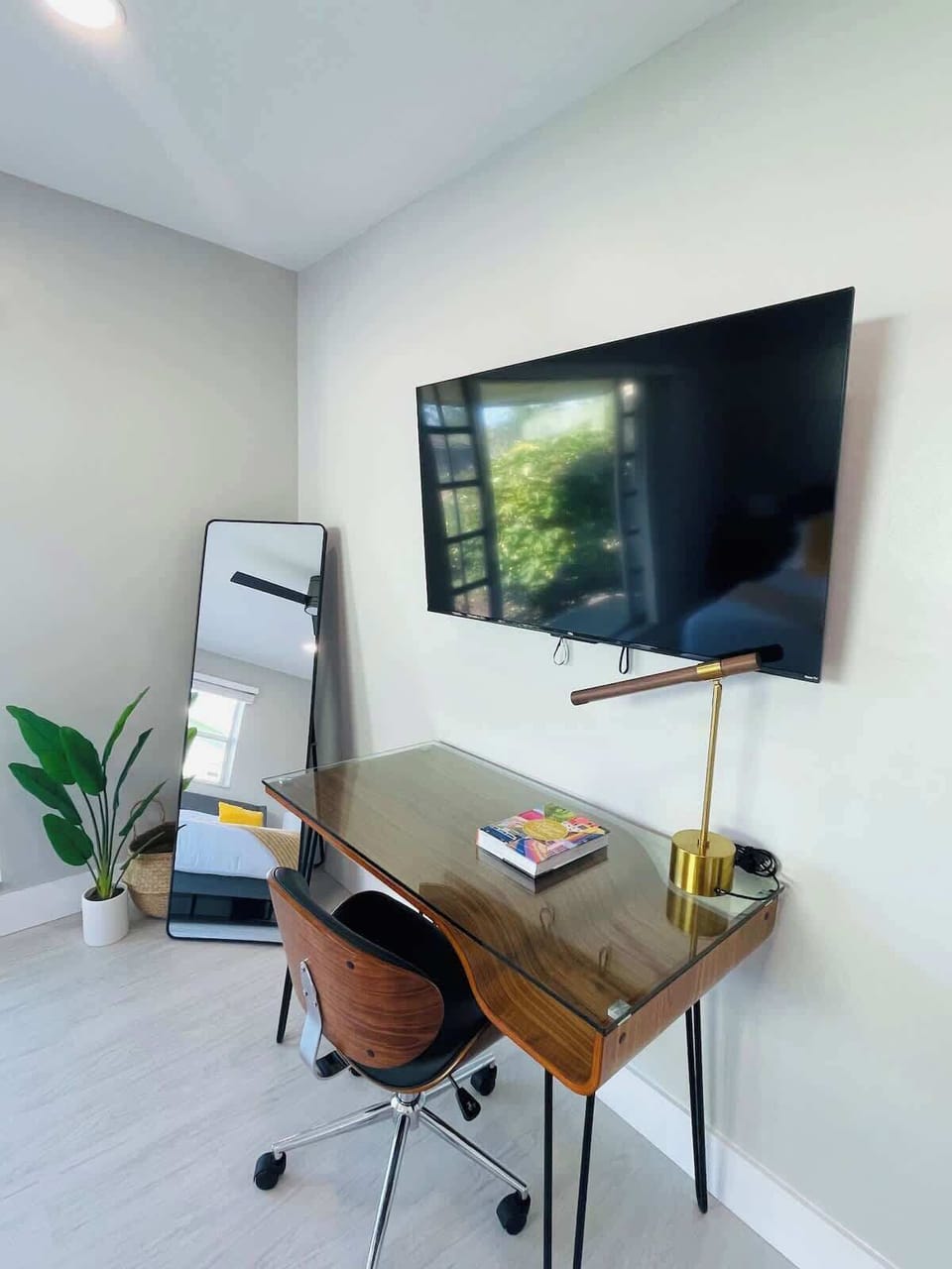 Dedicated Work From Home (WFH) area with desk, chair, lamp in a private room; high-speed wifi (500+MBPS)