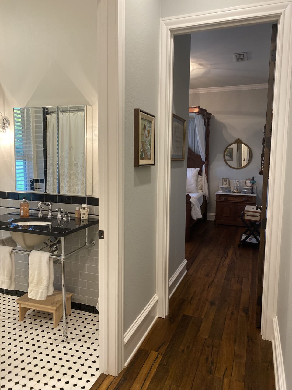 Bath set off hallway from Room