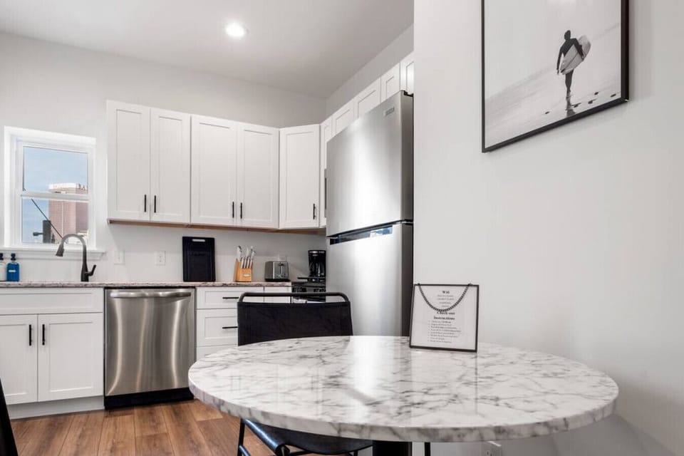 This stunning kitchen is perfect for entertaining guests or enjoying a quiet meal at home.