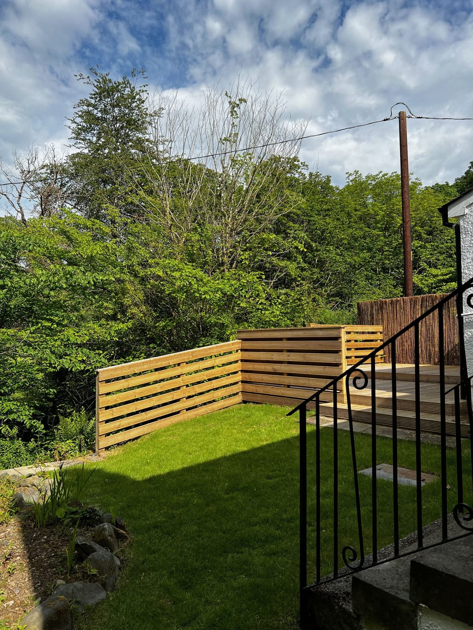 The grassy area of the garden.