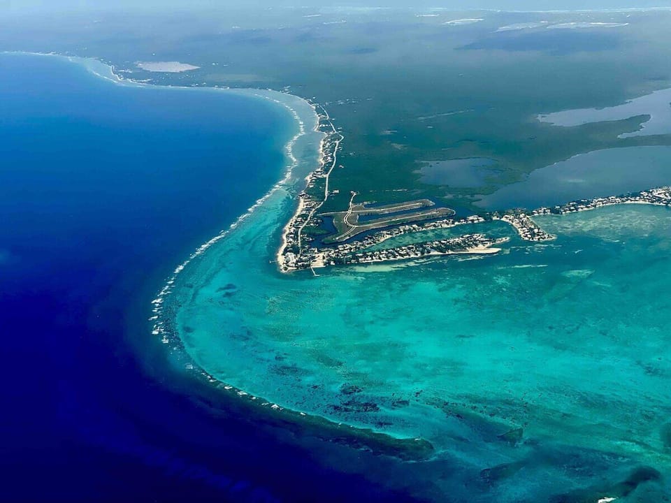 Turquoise Waters and Tropical Haven ️ Discover the Beauty of Rum Point's Marine Protected Paradise. A hidden gem on the North Wall with stunning views of the Barrier Reef. ️ #Paradise #BarrierReefViews #RumPoint 

