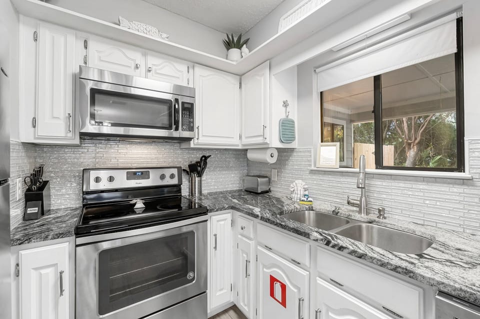 Fully equipped kitchen with everything needed for easy family meals and beachside breakfasts.